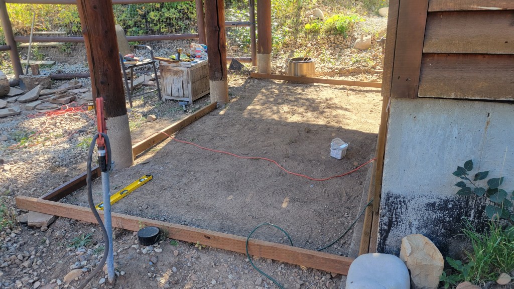 The initial foundation setting of a sauna and screen porch affixed to a mountain home in the Wasatch mountains of Utah.